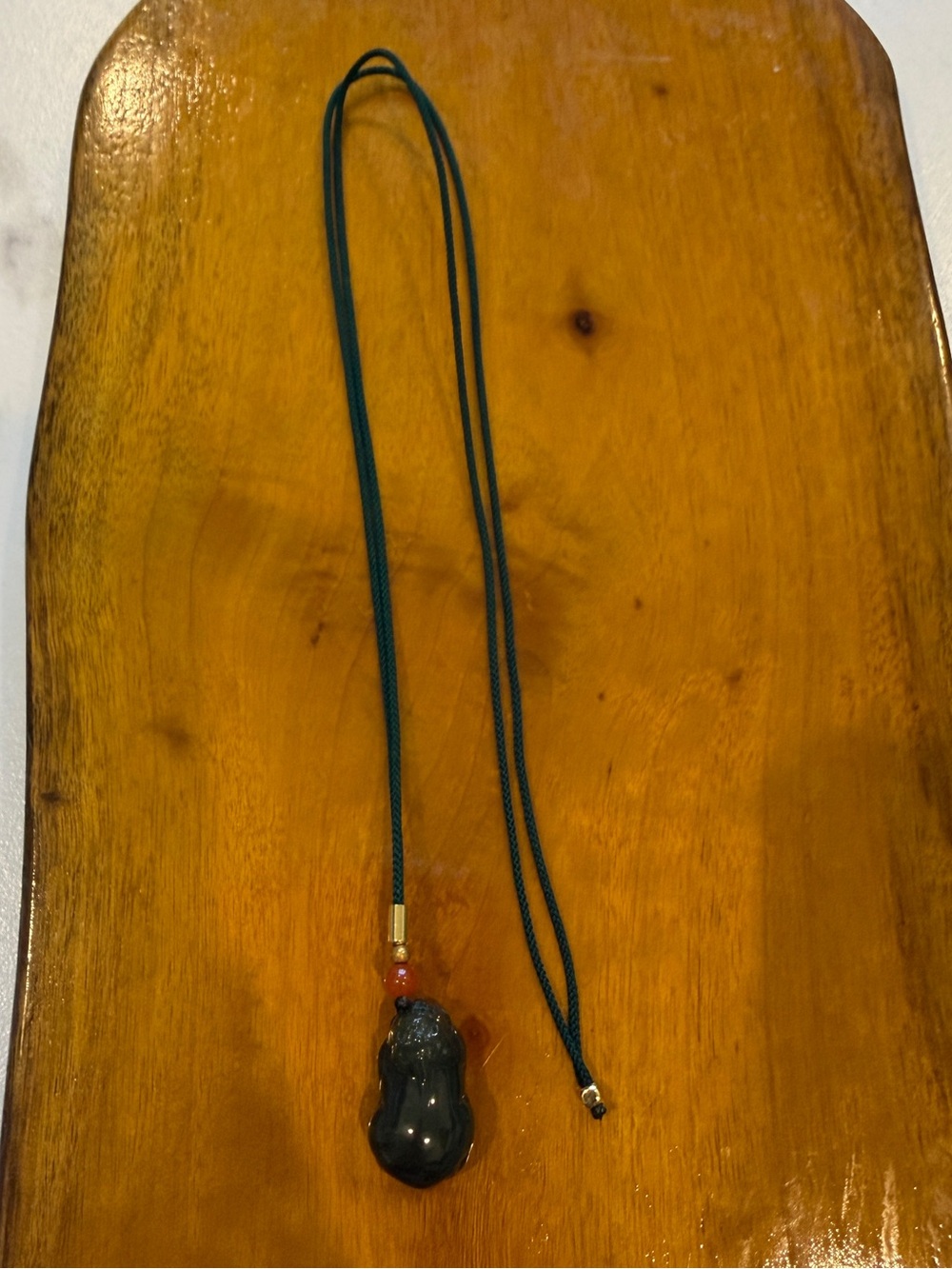 Unbranded Black Jade Pendant on Dark Green Cord Necklace